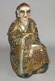 Satsuma Budha 
Figur, Japan, 
19. 
Jahrhundert. 
Polychrom 
dekoriert mit 
Vergoldung. H:. 
31 cm.