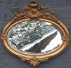 Vergoldet oval 
Nyrococo 
Spiegel. 
D&auml;nemark, 
aus dem 19. 
Jahrhundert. 
Facettierte 
Spiegel. ...