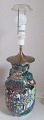Chinesische 
Tischlampe 
Porzellan, 20. 
Jahrhundert. 
Polychrome 
Dekoration mit 
Palastszenen 
und ...