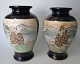 Paar 
japanischen 
Satsuma Vasen, 
19. 
Jahrhundert. 
Mit blauer 
Glasur. Szenen 
mit Männern und 
...
