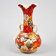 Satsuma Vase. 
Fayencen. Japan 
des 19. 
Jahrhunderts. 
Polychrome 
Dekoration mit 
Figuren. H: 20 
cm.
