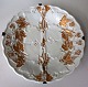 Meissen teller, 
19. Jh. Weißes 
Porzellan mit 
Vergoldung. 
Dekoration in 
Form von 
Weinblättern 
und ...