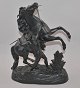 Pferdeskulptur 
aus Zinkguss, 
19. Jh. Höhe: 
40 cm L. 31 cm.