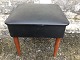 Sewing box in 
black 
artificial 
leather with 
massive 
teakben. Danish 
modern from the 
1960s. Nice ...