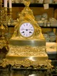 CONSOLE EMPIRE 
ANNO 1860 HAT 
GOLDED BRONZE 
PENDICLE HÄNGT 
IM KABEL Die 
Uhrenzange um 
Hilfe von ...