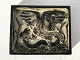 Royal 
Copenhagen # 
21719, Relief 
mit Schlange 
und Adler, 22 
cm breit, 17,5 
cm hoch, Design 
Knud ...