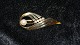 Elegant Broche 
i 14 karat guld
Stemplet 585
Længde 5,5 cm
Tjekket af 
guldsmed 
Varen findes 
...