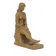 Skulptur in 
Form von einer 
sitzenden Frau
Signiert "ML 
60"
H: 28cm. B: 
11cm. L: 21cm