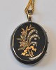 Antike 
Fotoaufbewahrung, 
vergoldetes 
Silber mit 
Emaille und 
Perlen, 19. Jh. 
Dekoration in 
Form ...