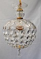 Glasprisme, 
Kuppel aus dem 
20. Jahrhundert 
mit Schliff und 
110 Prismen. 
H.: 33 cm. 
Durchmesser: 
...