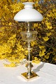 Old paraffin 
lamp with Brass 
foot. Fine 
opaline glass 
globe from 
Holmegaard. 
Height  60 cm. 
Fine ...