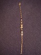 Armbänder
Gold 9 Karat 
375
verziert mit 3 
Zirkonia Länge 
18,5 cm
