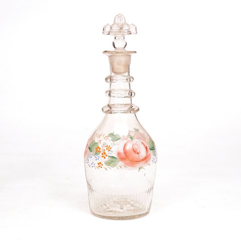 Enamel decorated glass carafe. Circa 1860. H: 
24,5cm