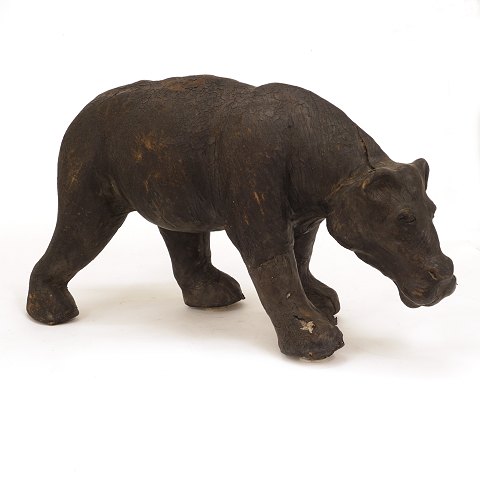 A large leather hippopotamus. In the manner of 
Dimitri Omersa. H: 35cm. L: 65cm. W: 22cm