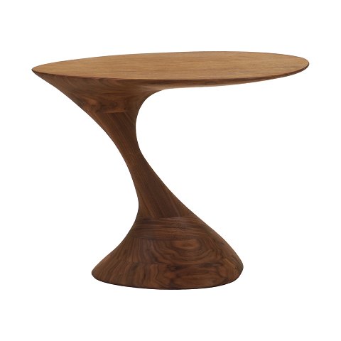 Oval walnut lamp table by Morten Stenbæk, Denmark. 
Signed Morten Stenbæk. H: 48cm. Top: 64x41cm