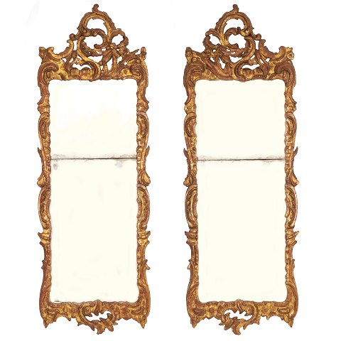 Pair of gilt Rococo mirrors. Northgermany circa 
1760. H: 156cm. W: 57cm