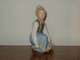 Royal 
Copenhagen 
Overglaze, boy 
from Amager, 
decoration 
number 12414, 
factory first, 
height 15 ...