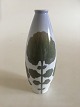 Royal 
Copenhagen Art 
Nouveau Grøn 
Vase No 
312/199. Måler 
21,5cm og i 
perfekt stand.