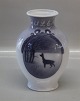 Kgl. RC 1922 
Julen Vase 17.8 
cm fra Royal 
Copenhagen I 
hel og fin 
stand
