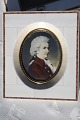 Miniature 
painting in 
ivoryfame, 
Mozart. Seize 
14,3 X 12,4 cm. 
Fine condition.