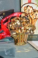 Georg Jensen 
Weihnachtsmobile 
2008. 
Christrose, 
vergoldet 
messing. Design 
: Regize 
Overgaard. ...