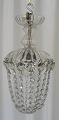 Kleine 
Prismenkrone, 
Dänemark, 19. 
Jahrhundert, 
H.: 33 cm. Mit 
neuerer 
Verkabelung. 
Gesamt: 146 ...