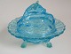 Butter Halter 
in Form von 
Kuh, blau Glas. 
um 1900.
