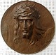 Kobberplaquette 
mit Christus. 
Frankreich, 0. 
1900. 
Durchmesser:. 
47,5 cm. Die 
Nase ist 
repariert.