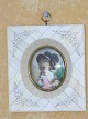 Miniature 
painting. 
Painted on 
ivory in frame 
of ivory.