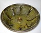 Große antike 
pate / 
Auflaufform, 
grün glasiert, 
aus dem 19. 
Jahrhundert. 
H.: 9,5 cm. 
Dia.: 29,5 cm.