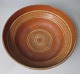 Antique Tontopf 
mit 
Dekorationen, 
19. 
Jahrhundert. 
Orange und 
helle Glasuren. 
H:. 7,5 cm. 
Dia:. ...