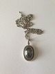 Anton Michelsen 
Sterling Silver 
Pendant with 
Hematite. 
Measures 3.3 cm 
and chain 44 cm 
long. ...