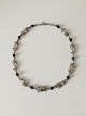 Georg Jensen 
Sterling Silver 
Necklace with 
Blue Stones No 
15. Measures 
50.1 cm / 19 
3/4 in. With 
...