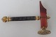 Siegel. 1900 
Messing 
vergoldet und 
Emailarbeiten. 
Design als 
Hammer. 
Hammerkopf in 
Achat und ...
