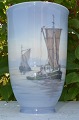 Royal 
Copenhagen. 
Vase decorated 
with 
fishing,boat 
no. 2819-3549. 
height 22,5 cm. 
Diameter 14.7 
...