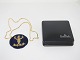 Rosenthal 
studio-line, 
Bjorn Wiinblad, 
Porcelain 
pendant with 
gilded sterling 
silver necklace 
in ...