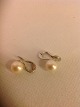 Perlen-Ohr-
Clips.
White Gold 14k 
585
Sautsea Perlen 
9 mm.
Nypolert und 
...