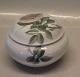 Royal 
Copenhagen 
173-400 RC Art 
Nouveau bonbon 
box, round 9.5 
x 13 cm 
Decorated with 
flower ...