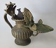 Ganesha 
Öllampe, 
Indien, 19. 
Jahrhundert. 
Cire perdue. 
Mit Schale und 
Container. H:. 
13 cm. L:. ...