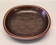 Aluminia Royal 
Copenhagen 
Stoneware
2636 Marselis 
Royal Brown 
14.5 x 3 cm. 
Round - with 
small ...