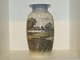 Royal 
Copenhagen 
large vase with 
thatched farm 
house, that is 
decorated all 
the way ...