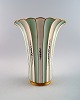 Royal 
Copenhagen 
cracked / 
crackle 
trumpet-shaped 
vase, hand 
painted with 
flowers. 
Approximately 
...