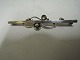 Georg Jensen. 
Sterling (925). 
Broche. 
Design-234B. 
Länge 6 cm. 
Produziert 1945 
-1951