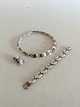 Georg Jensen 
Sterling Silver 
Jewelry Set No 
94. Necklace No 
94B 36 cm L. 
(14 11/64"). 
Weighs 57 ...