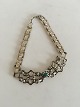Georg Jensen 
Early Silver 
Choker / 
Necklace with 
Green Agate. 
From 1904-1908. 
There is 7 and 
8 ...