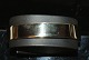 Bangle, 14 
Carat Gold
Stamp: 585, 
OKB
Goldsmith: 
1979-1984 Ole 
Berg
Inside 
dimensions: ...