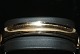 Bangle, 14 
Carat Gold
Stamp: 585
Goldsmith: 
Indistinctly 
maker's mark
Inside ...