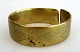 Afrikanisches 
Armband, 19. 
Jh. Bronze. Mit 
Dekorationen. 
H:. 2,5 cm. 
Dia:. 7,5 cm.