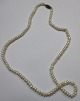 Echte Perle 
Kette, des 20. 
Jahrhunderts L: 
56 cm. Mit 
Messingschloss.
