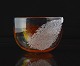 Skål i glas med 
orange og hvidt 
mønster.
Kugleslebet 
formentlig 
holmegaard
H. 11 cm. Ø. 
16 ...